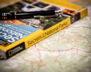 Map with Book and Pen